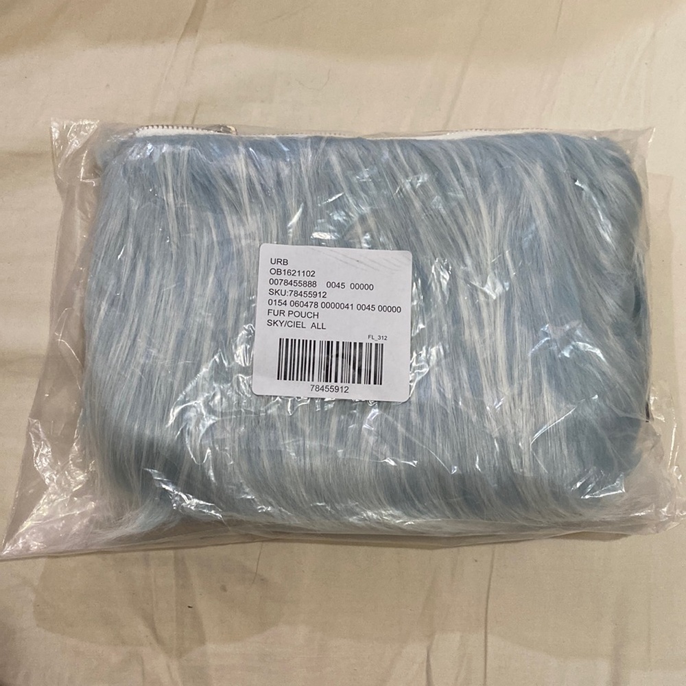 sky blue furry pouch